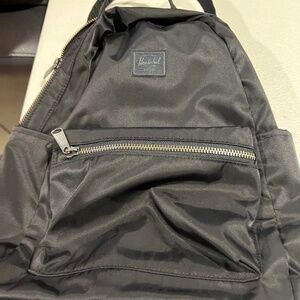 Herschel black nylon backpack.